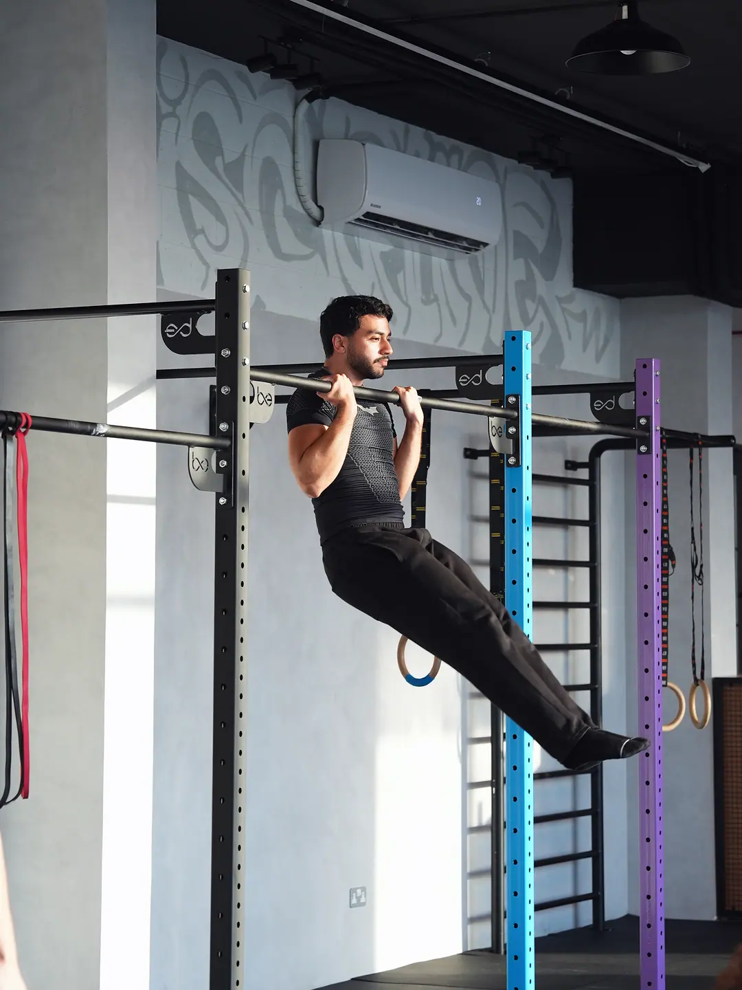 A member holding a front lever on the bar