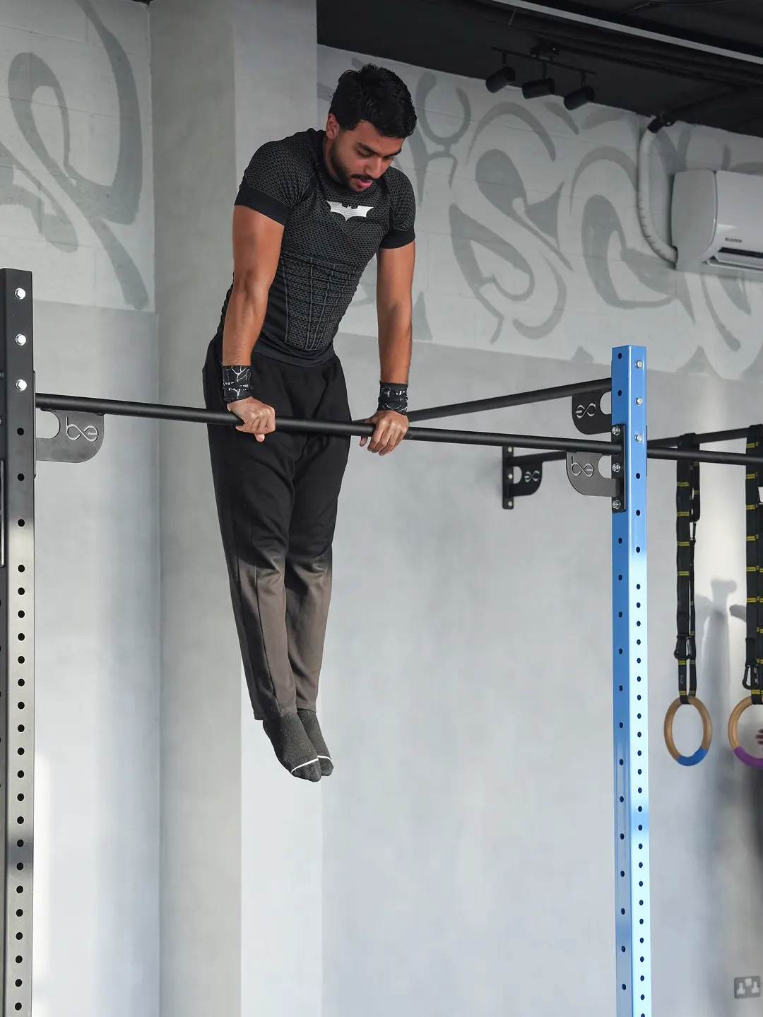 A member working on the bar mid-session